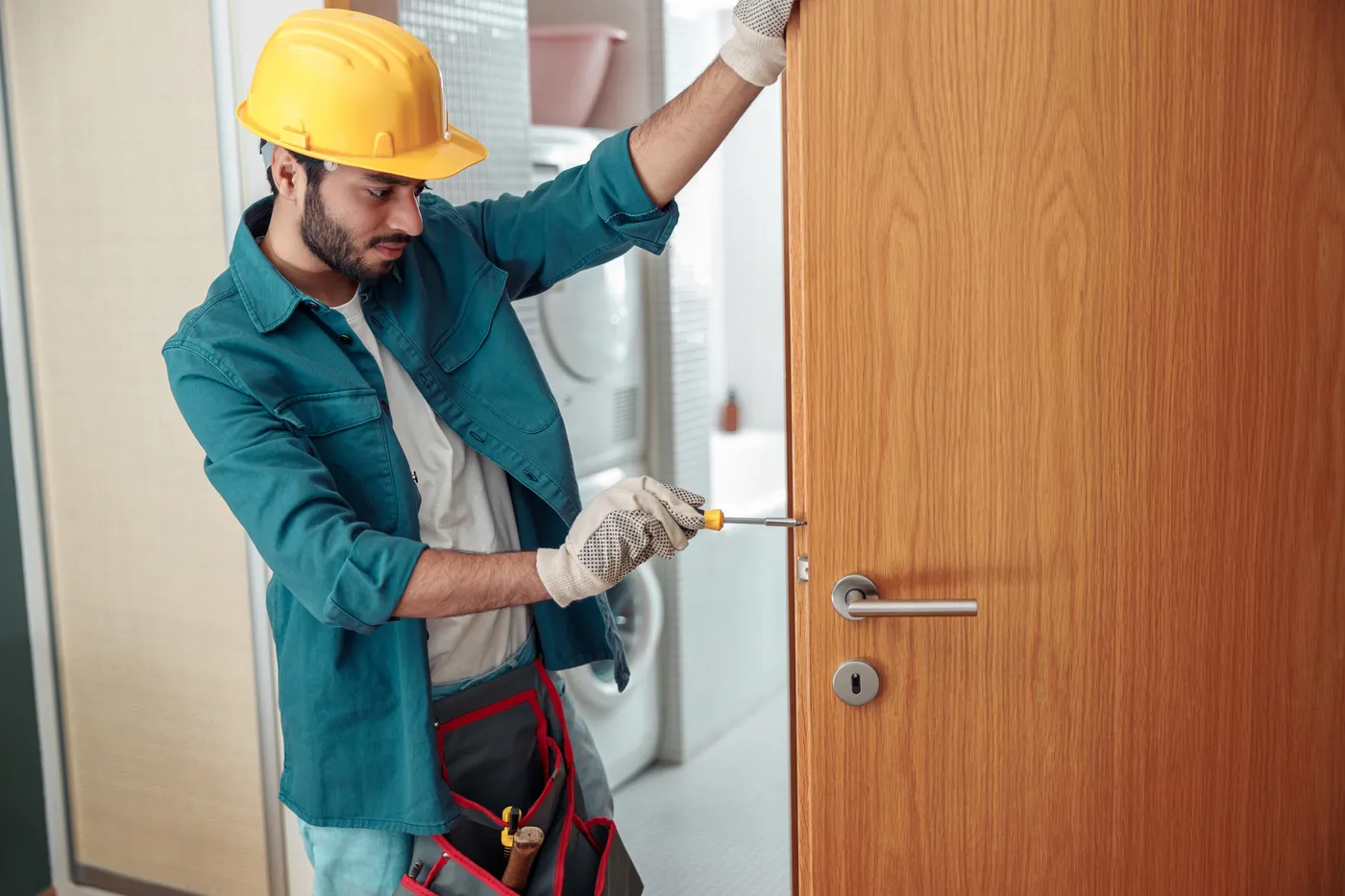 Installation d'une serrure sur une porte palière de copropriété aux Blagis